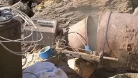 Séparation de l'ogive du corps de la bombe à l'aide d'une découpeuse hydroabrasive
