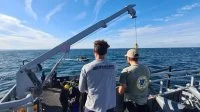 Plongeurs-démineurs et scientifiques du DRASSM sur le pont du Vulcain