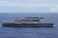 Les porte-avions américain USS Carl Vinson, japonais Kaga et français Charles de Gaulle