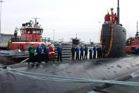 Le Père Noël rentre de mer sur le pont d’un SNA américain