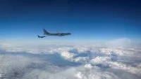 Un chasseur Rafale Marine se ravitaille auprès d'un A330 Phénix de l’armée de l’Air et de l’Espace