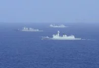 Le destroyer USS Strerett et 2 navires chinois
