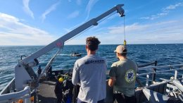 Plongeurs-démineurs et scientifiques du DRASSM sur le pont du Vulcain